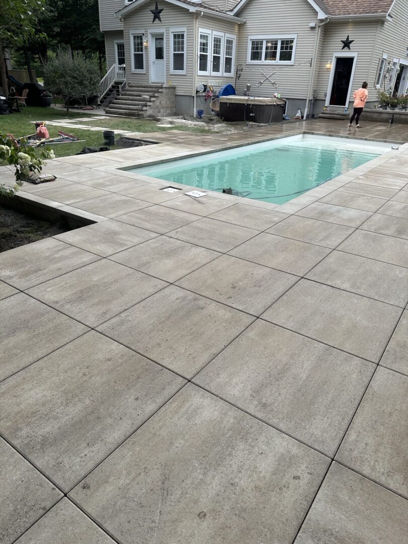 travaux pavé uni bord de piscine