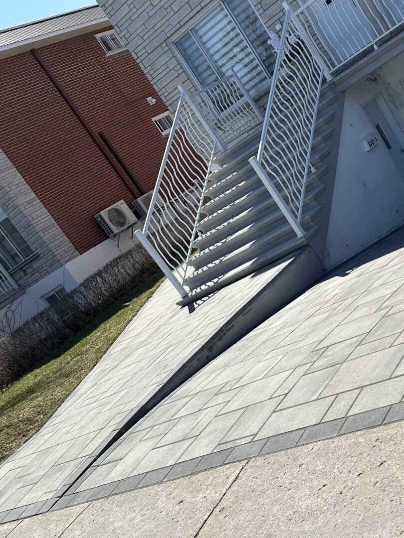 travaux pavé uni devanture de porte